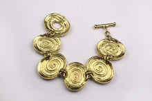 YVES SAINT LAURENT spiral oval medallions bracelet