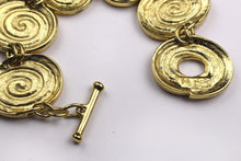 YVES SAINT LAURENT spiral oval medallions bracelet