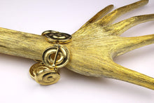 YVES SAINT LAURENT spiral oval medallions bracelet