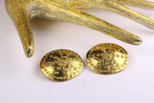 YVES SAINT LAURENT circular earrings