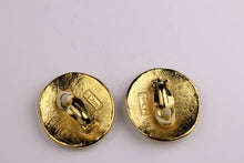 YVES SAINT LAURENT circular earrings