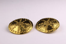 YVES SAINT LAURENT circular earrings