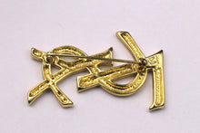 YVES SAINT LAURENT logo brooch