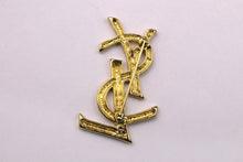 YVES SAINT LAURENT logo brooch