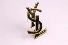 YVES SAINT LAURENT logo brooch