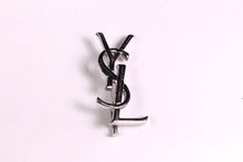 YVES SAINT LAURENT Logo silver brooch