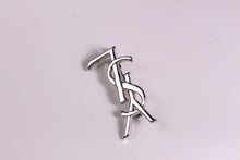 YVES SAINT LAURENT Logo silver brooch