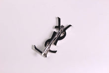 YVES SAINT LAURENT Logo silver brooch