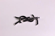 YVES SAINT LAURENT Logo silver brooch