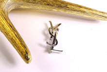 YVES SAINT LAURENT Logo silver brooch