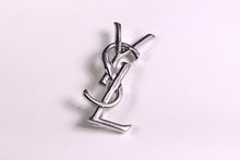 YVES SAINT LAURENT Logo silver brooch