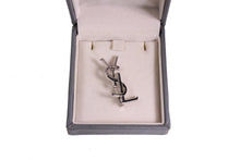 YVES SAINT LAURENT Logo silver brooch