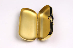 YVES SAINT LAURENT gold plated pillbox