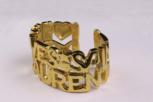 YVES SAINT LAURENT letter heart star cuff bracelet