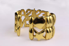 YVES SAINT LAURENT letter heart star cuff bracelet