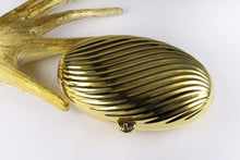 MENBUR golden metal oval-shaped clutch