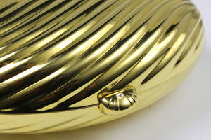 MENBUR golden metal oval-shaped clutch