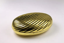 MENBUR golden metal oval-shaped clutch