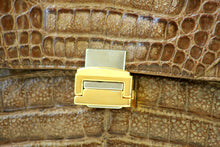 Tobacco brown crocodile skin handbag