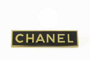 CHANEL rectangular logo brooch