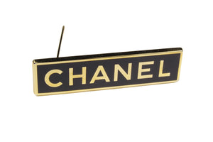 CHANEL rectangular logo brooch