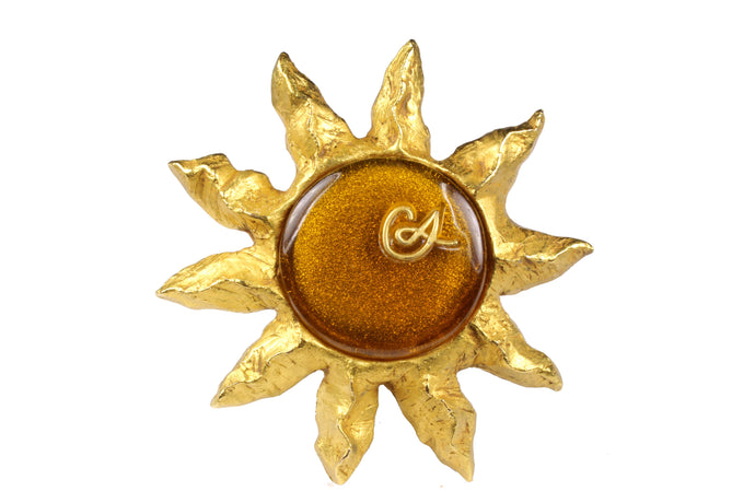 CHRISTIAN LACROIX large amber resin sun brooch