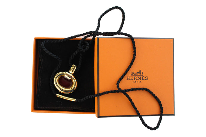 HERMÈS bottle perfume diffuser pendant necklace
