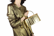 GOLDSTROM gold and lucite handbag