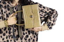 Toasted beige crocodile skin handbag with flap and single handle