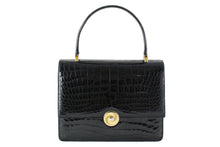 ORLAN jet black crocodile skin flap handbag with central clasp