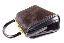 Black leather and brown fur frame handbag