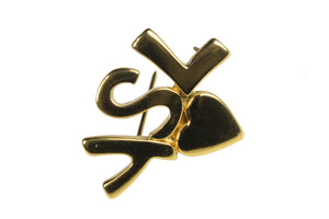 YVES SAINT LAURENT initials over heart brooch