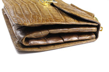Tobacco brown crocodile skin handbag