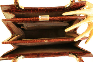 Crocodile skin frame handbag with twin handle