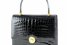 ORLAN jet black crocodile skin flap handbag with central clasp