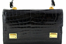 Jet black crocodile skin handbag with flap and double clasp