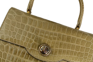 Toasted beige crocodile skin handbag with flap and single handle