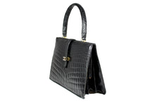 Black crocodile skin frame handbag with front fastening