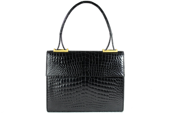 Jet black baby crocodile handbag with decorative handle