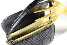 Black crocodile skin handbag with adjustable handle