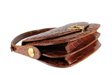 Elongate cognac crocodile skin shoulder bag