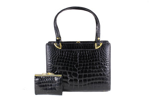 Black crocodile skin frame handbag with twin handles