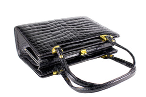 Black crocodile skin frame handbag with twin handles