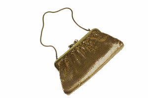 Gold mesh handbag with rhinestone clasp