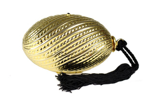 Golden egg clutch with wrist tassel