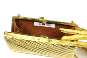 Gold metal clutch with diagonal engraving