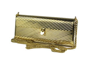 Gold metal flap clutch with diagonal engraving