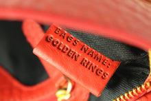 D&G, DOLCE & GABBANA golden rings red handbag