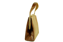 Caramel color lizard skin handbag