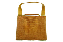 Caramel color lizard skin handbag